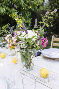 Close-up of flower vase on table