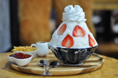 Close-up of strawberry cake on table