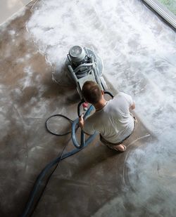 High angle view of man with reflection in water