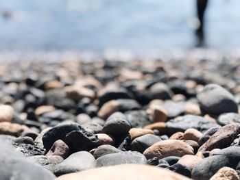 Close-up of stones on beach