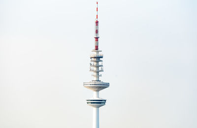 Communications tower against clear sky