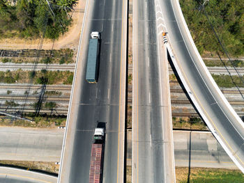 High angle view of railroad tracks by road