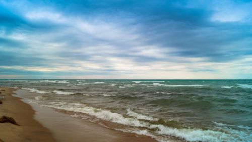Scenic view of beach against sky