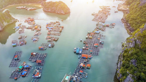 High angle view of sea by buildings in city