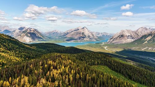 Scenic view of landscape and mountains against sky