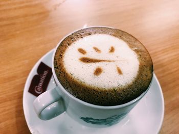 Close-up of cappuccino on table