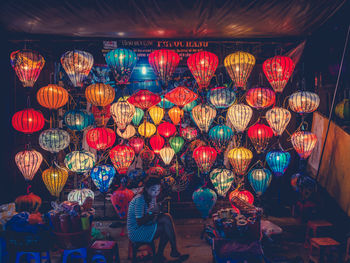 Illuminated lanterns hanging at night