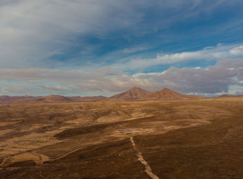 Scenic view of desert against sky