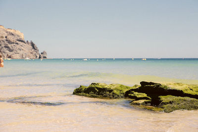 Scenic view of sea against clear sky