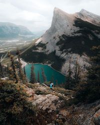 A man hiking through mountain peaks