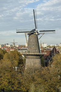 Large windmill in schiedam in autumn