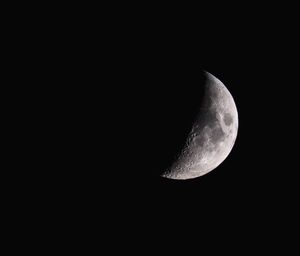 Low angle view of moon against sky at night