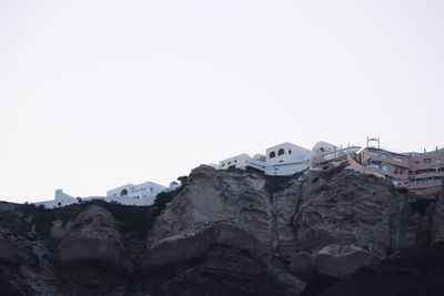 Low angle view of buildings against clear sky