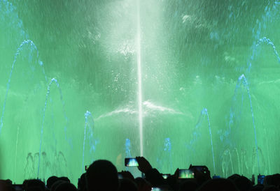 People enjoying dancing fountain