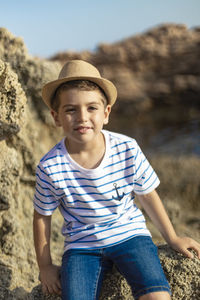 Portrait of teenage boy wearing hat