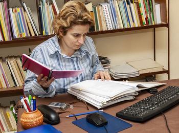 Woman working at desk in office