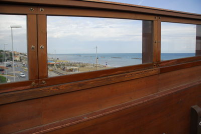 Scenic view of sea seen through window