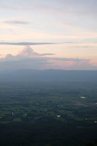 Scenic view of landscape against sky during sunset