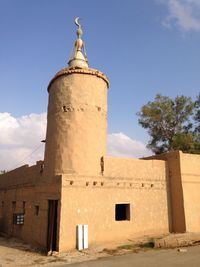 A mud mosque minaret in saudi arabia
