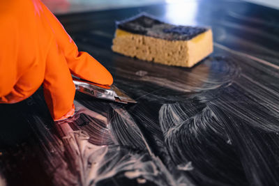 Close-up of man working on table