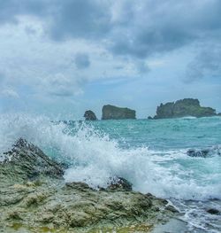 Sea waves splashing on rocks