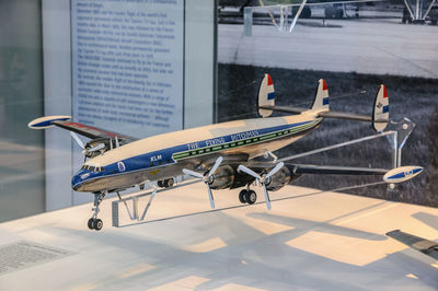 Close-up of airplane on airport runway