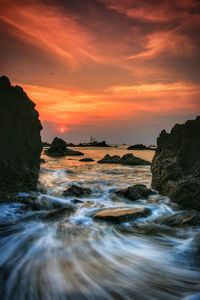 Scenic view of sea against sky during sunset