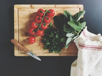 High angle view of vegetables on cutting board