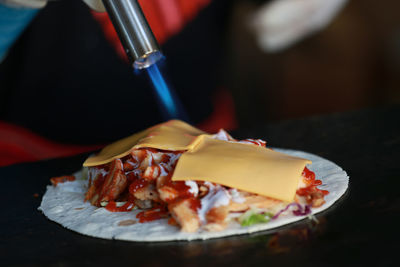 Close-up of meat in plate on table