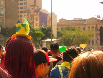 Group of people in front of buildings