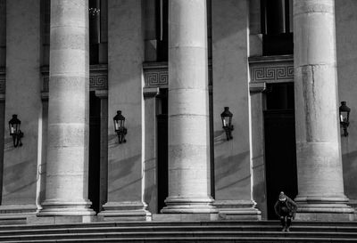 People walking in front of building