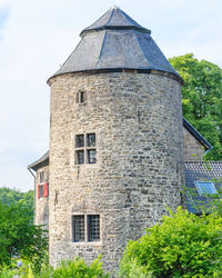 Low angle view of old building against sky