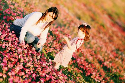 High angle view of women on flowering plants