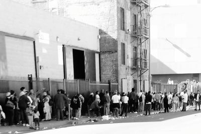 Group of people in front of building