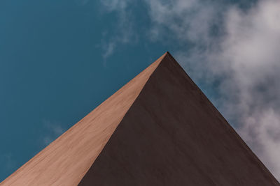 Low angle view of historical building against cloudy sky