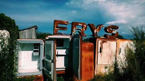 Rusty refrigerators in junkyard
