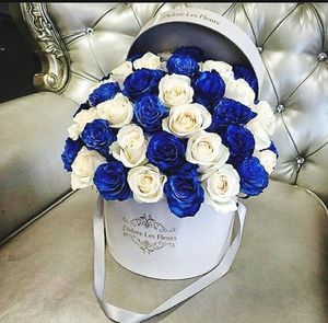 Close-up of blue roses in vase