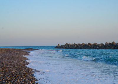 Scenic view of sea against clear sky