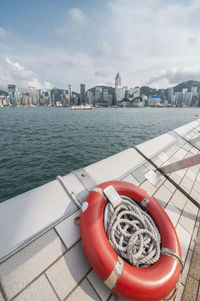 Scenic view of river against sky in city of hong kong