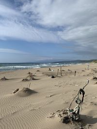 Scenic view of beach against sky