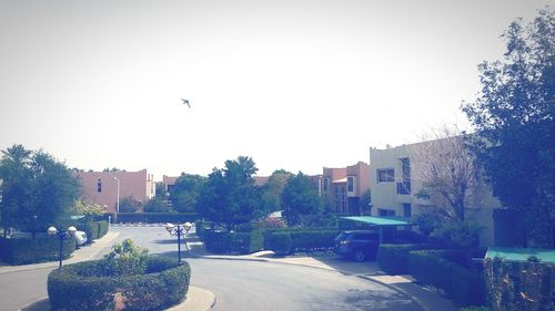 View of road along buildings