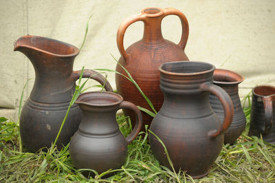 Close-up of old objects on grass