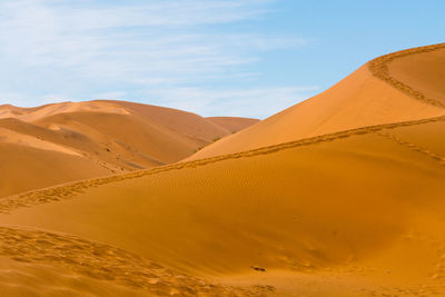 Scenic view of desert against sky