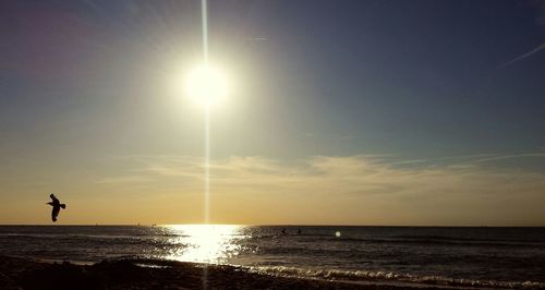 Scenic view of sea at sunset