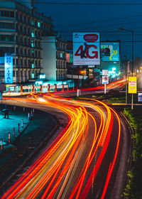 Light trails on city street at night