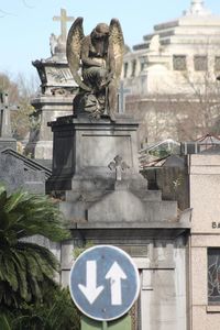 Low angle view of statue against building