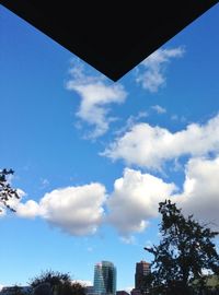 Low angle view of built structure against blue sky