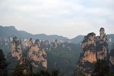 Scenic view of rock formations against sky