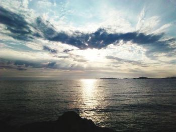 Scenic view of sea at sunset