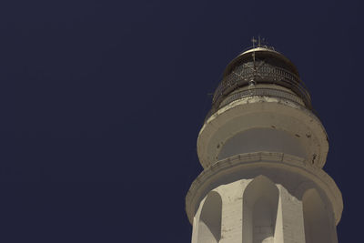 Low angle view of dome against clear sky at night